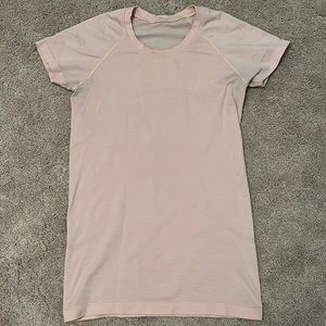 Size 6 light pink lulu lemon shirt!